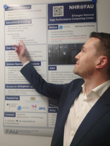 Researcher Sebastian Wind in front of a poster at AI Day 2025